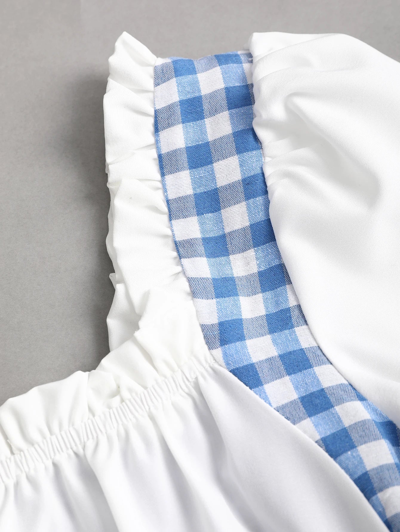 Blue and white gingham square necked puff sleeved lace up short dress